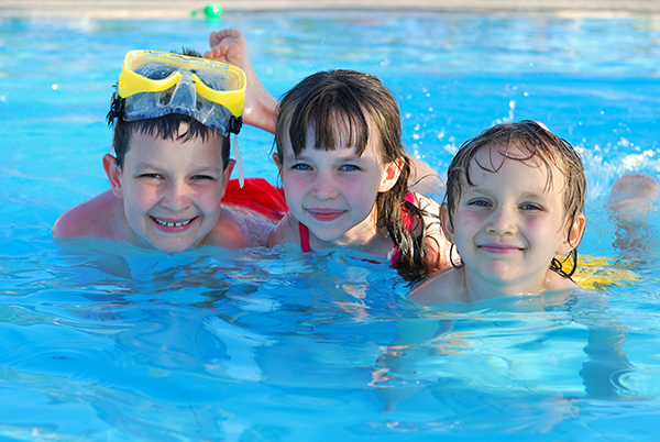 Children swimming in pool